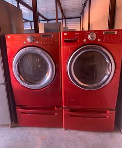 LG Washer And Electric Dryer Matching Set With Pedestals