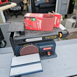 Ryobi Benchtop Combination Sander (4-inch x 36-inch belt and 6-inch disc). It’s an older, heavy-duty blue model that runs strong and is perfect for wo