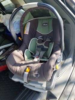 Infant car seat with carry handle and base