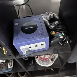 Game Cube And PS4 Consoles 