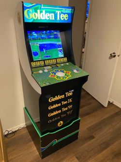 Golden Tee Classic arcade 1up machine with matching riser.