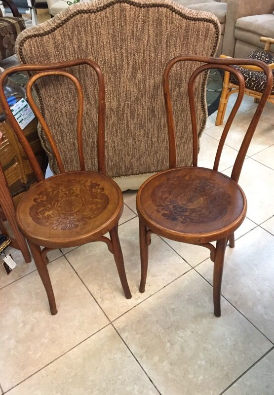 Pair of vintage wood ice cream chairs