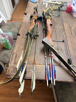 Two Recurve Bows with Arrows