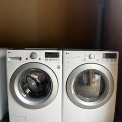 LG washer and electric dryer set. 