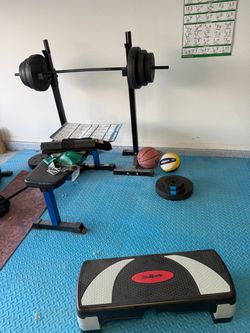 Home gym includes padded flooring