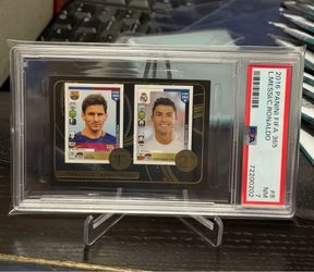 2016 Panini Fifa 365  Lionel Messi, Cristiano Ronaldo PSA 7
