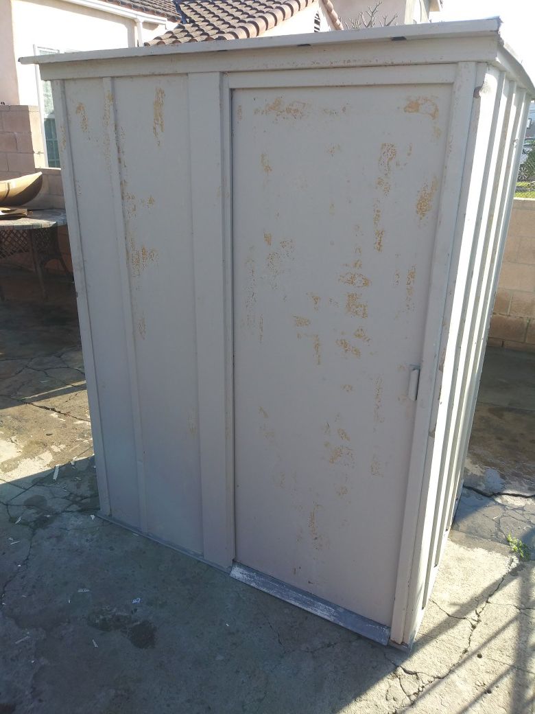 Metal storage shed. 68"T 54"W 43"D. I just bought it. It's to small for me. There's no floor.