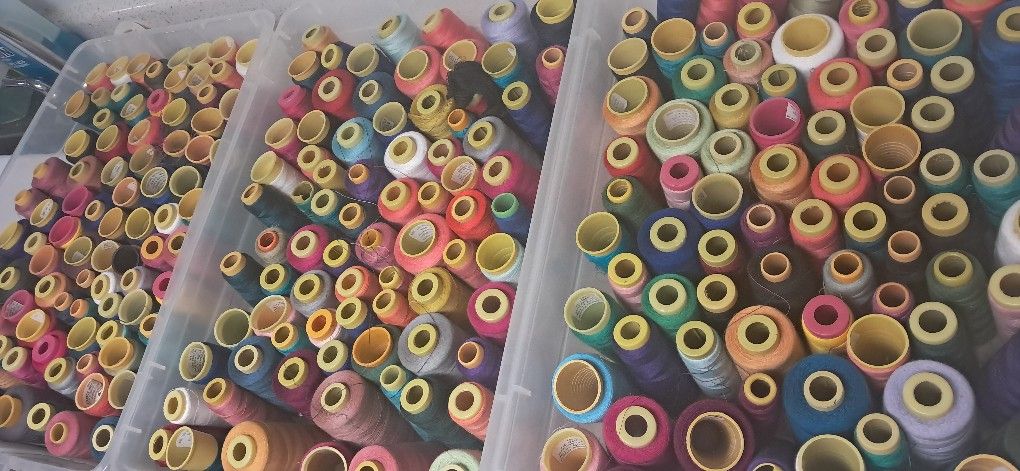 Over 170 spools of polyester Thread Comes With Cases