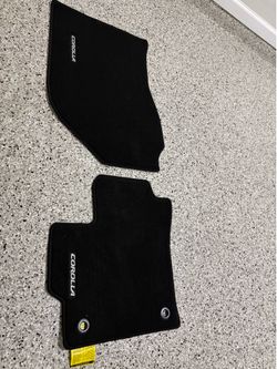 Corolla carpets (driver and front passenger)