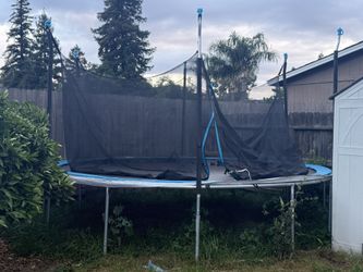 Almost New Trampoline 15 Foot With Net!