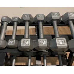 In NEW Condition Set Of Cast Iron Hex Dumbbells 5s, 10s, 15s 20s  And  25s  (NO RACK iNCLUDED)