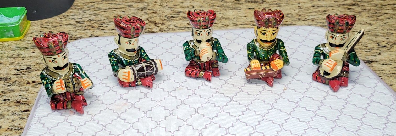 Five Musicians Carving