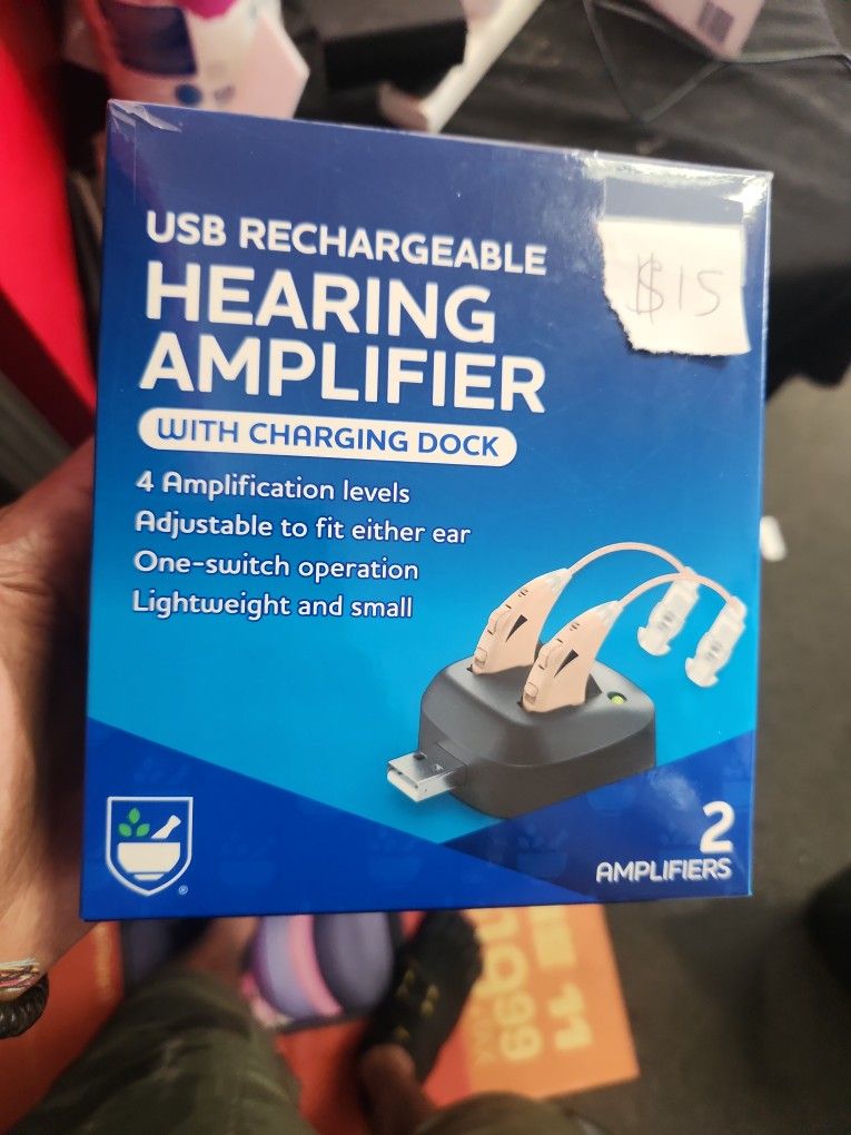 Hearing Amplifier With Charging Dock. Hearing Aids