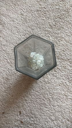 Glass vase with rocks