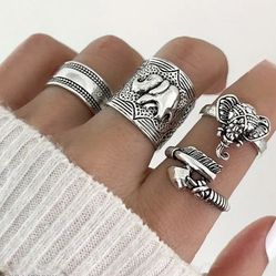 New Set Of 4 Silvertone Rings Size 7.5