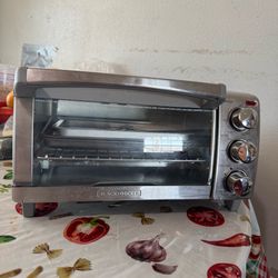 $35, BLACK+DECKER 4-slice toaster oven, model TO1760SS, stainless steel