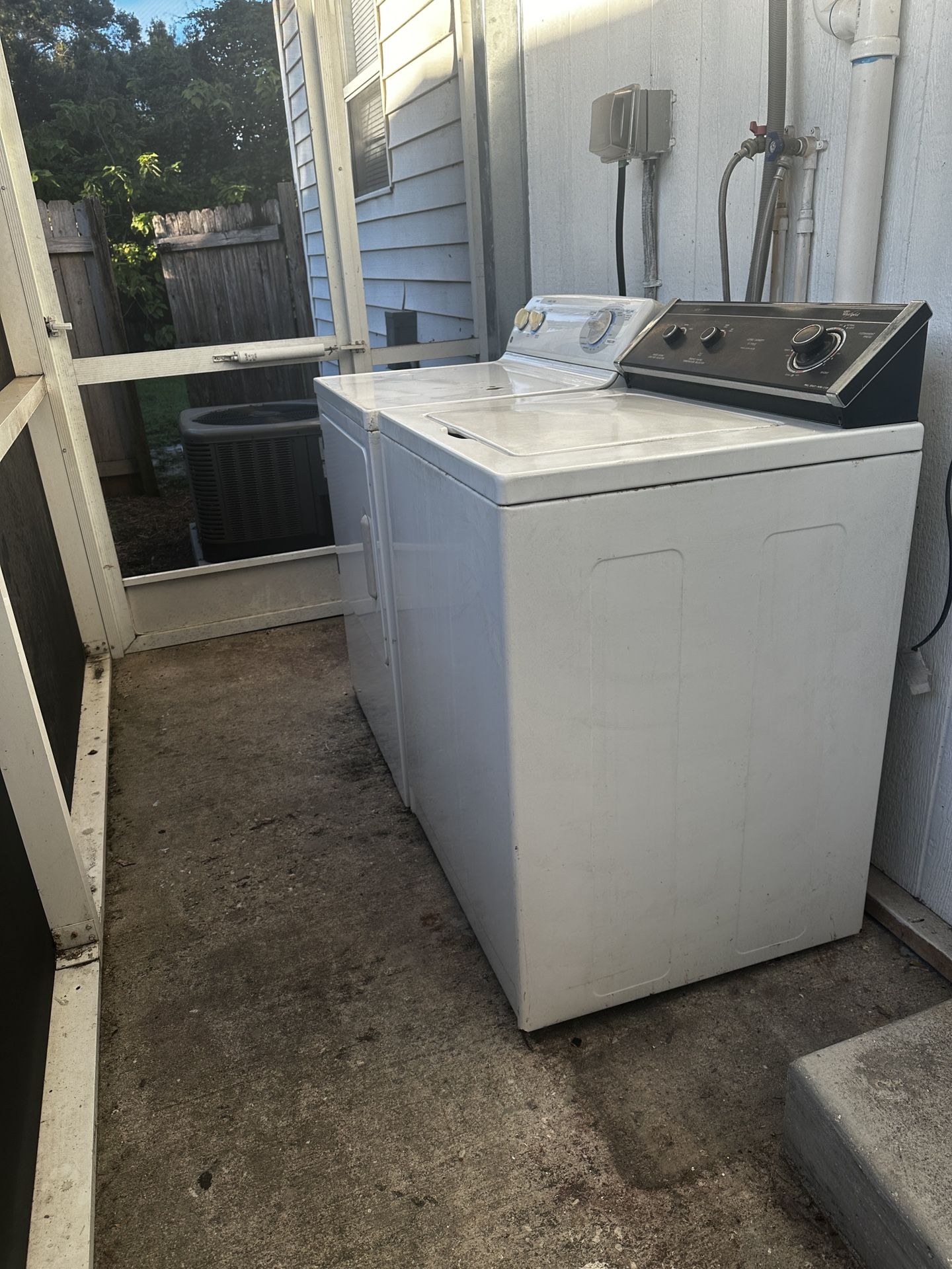 Whirlpool Washer and GE Dryer (both white)
