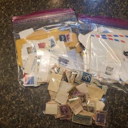 Stamps, 3 ziploc bags variety of canceled stamps