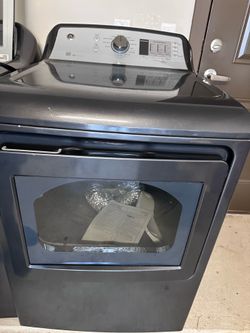 GE® Appliances washer and Electric Dryer.