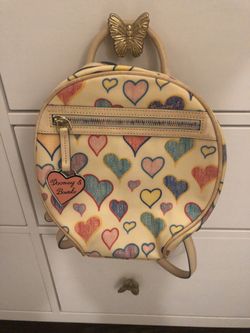 Authentic Dooney and Bourke backpack with wallet