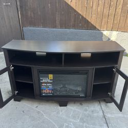 dark brown electric fireplace TV stand with a Spectrafire insert.  60inch