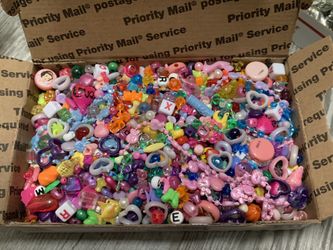 box of acrylic beads and embellishments