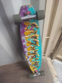 longboard with custom graffiti art