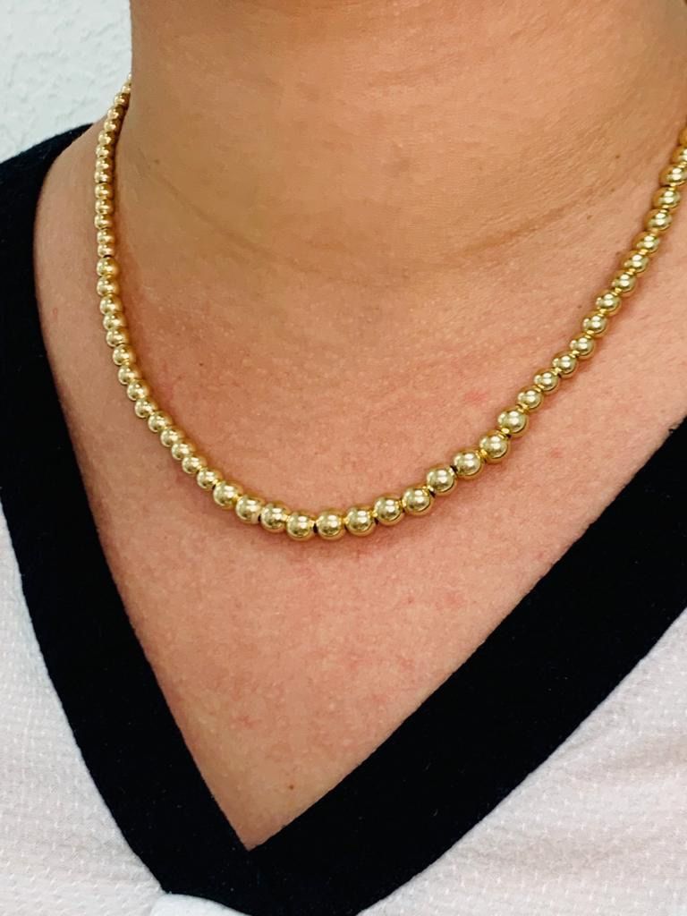 Linda cadena de mujer 14k