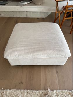 Cream fabric ottoman