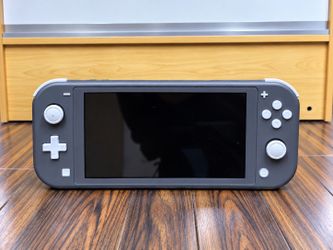 🎮 Nintendo Switch Lite Gray – Used – Good Condition