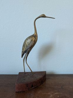 Vintage Brass Crain On Wood
