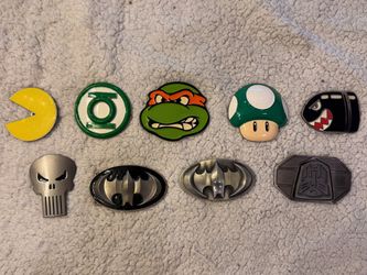 Bundle of belts and character belt buckles