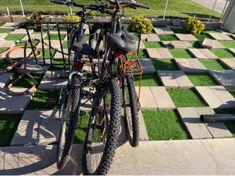 2 bicycles 24” , 1 bicycles27” all very good condition + the stand to hold 5 bicycles