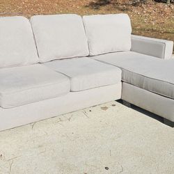 Living Spaces Egan II Reversible Chaise Sofa in Cement Gray