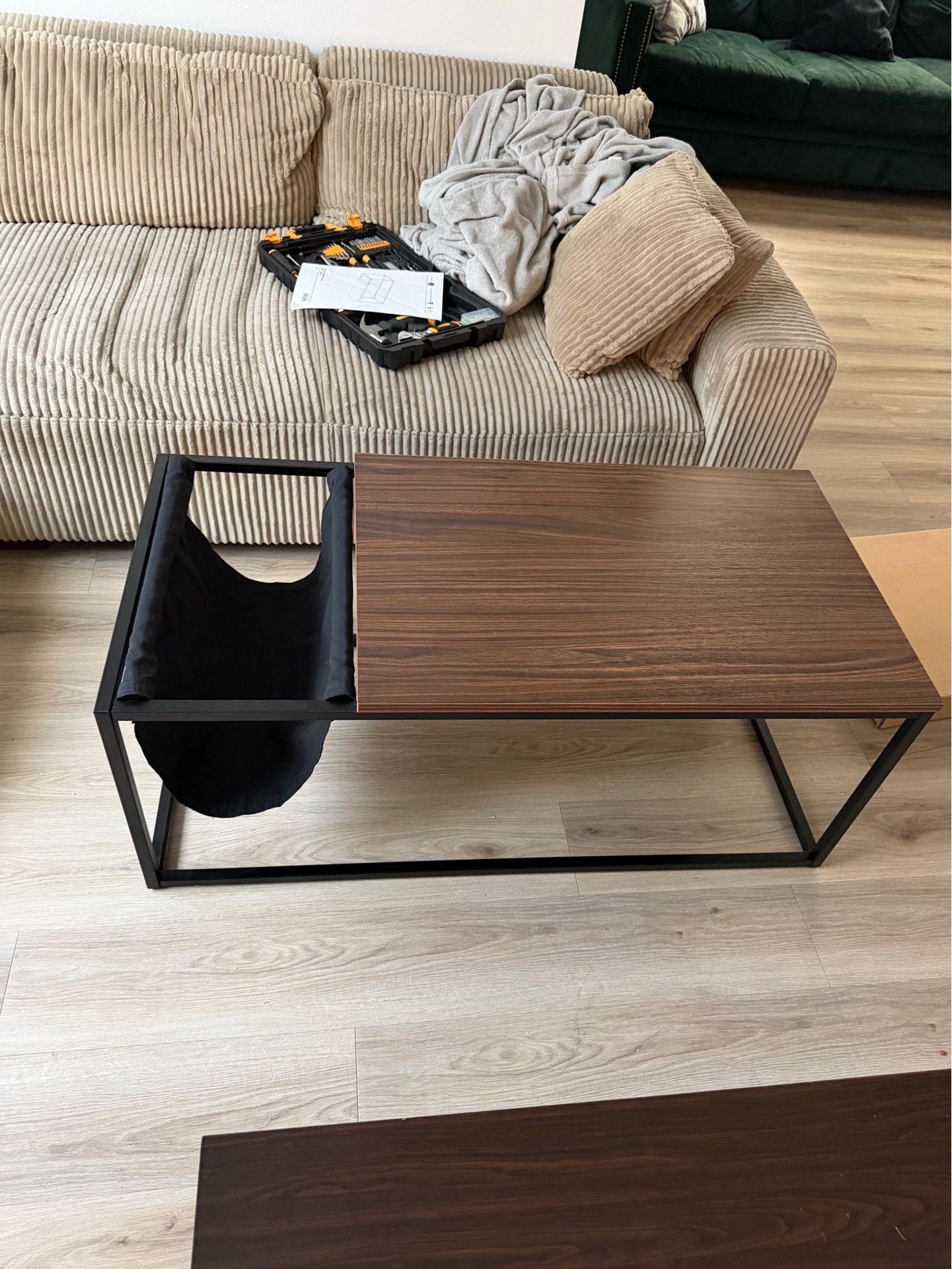 Coffee table with magazine holder