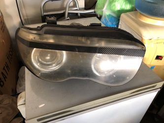 Bmw 745LI right side headlight with halos
