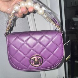 Badgley Mischka plum purple. 