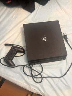 Sony PlayStation 4 Pro Console with Controller