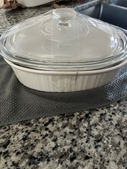 2 ceramic oval pans with glass lids