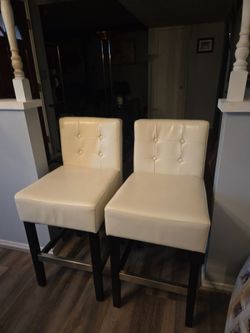Leather bar stools. (2) 100.00