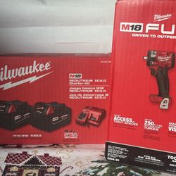 Milwaukee Drill Gun, Batteries And Charger. 