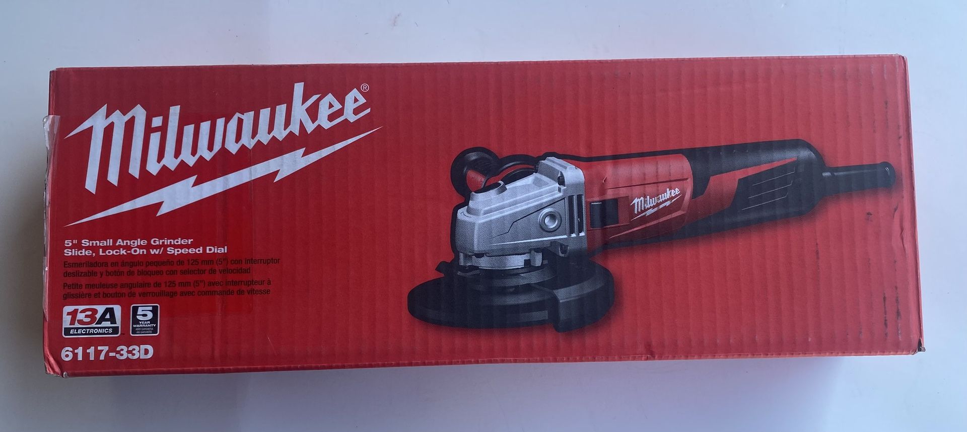 M16- Milwaukee 13 Amp 5 in. Small Angle Grinder with Dial Speed