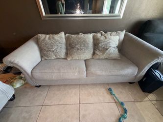 3 sofas and ottoman and