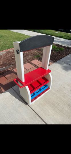 Little Tikes play stand.