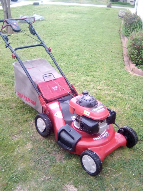 21 in Craftsman powered by Honda 5.5 HP selfpropelled lawn mower 125