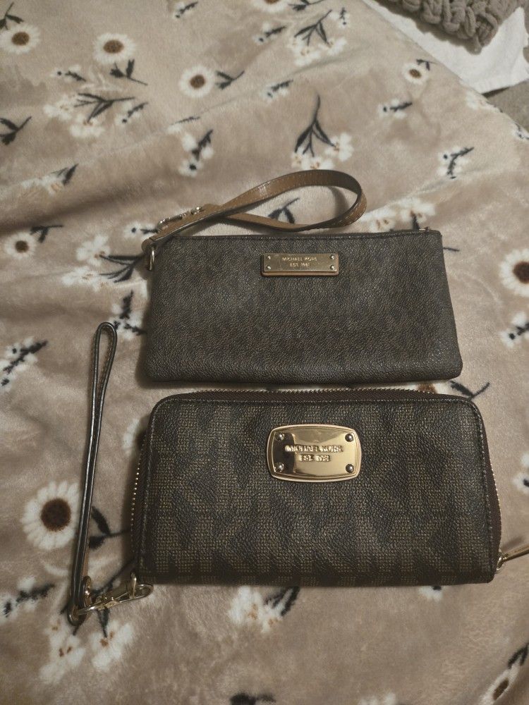 2 Michael Kor Wrist Wallet 1 With Compartments In Really Good Condtion.