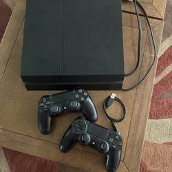 PS4 1TB + 2 Controllers + Games