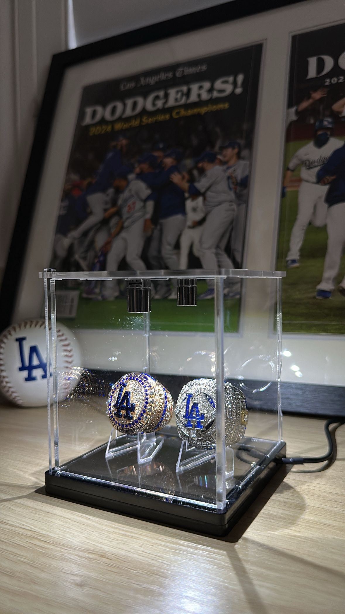 Dodgers 2020 & 2024 championship rings w/ LA Times collectible magazines.
