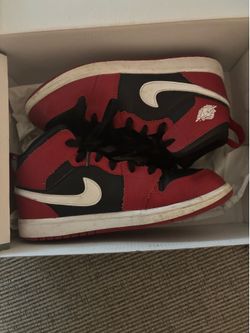 Kids red and black retro Jordan 1’s