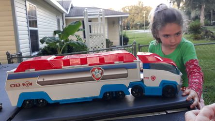 Paw patrol semi and a couple vehicles inside